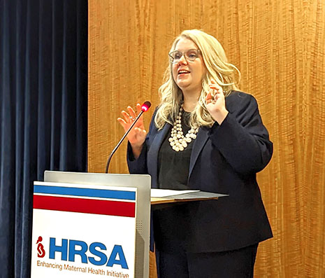 HRSA Administrator Carole Johnson speaking while standing at a lectern