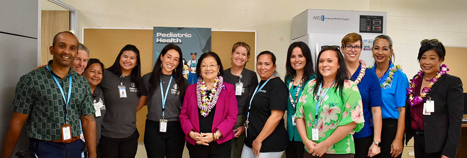 Group portrait with U.S. Senator Mazie Hirono, HRSA Regional Administrator Valerie Gallo, and health center staff