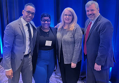 Group photo of HRSA Administrator Carole Johnson, MCHB Associate Administrator Dr. Michael Warren, and two state heath leaders. 