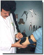 Hand therapist treating a patient image.