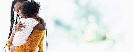 Woman holding infant